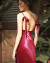 Slip and Tie, this exciting slip dress comes with a twist